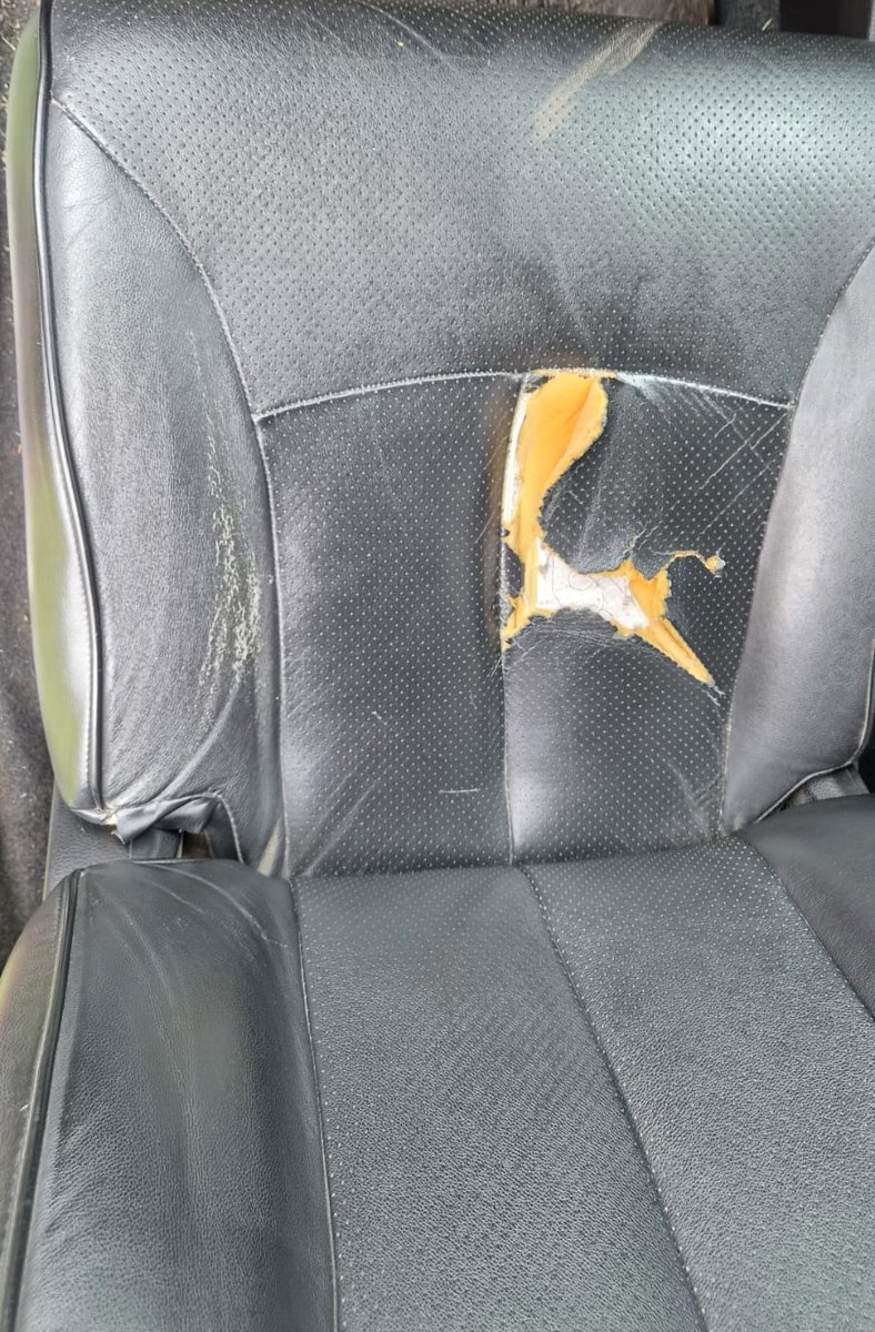 Antes: otra vista del asiento del conductor roto